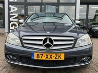 tweedehands Mercedes C180 K Avantgarde navigatie half leer climate controle cruise controle lm-velgen Elekt-pakket pdc