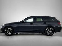 Occasion BMW 330e M Sport 292 PK (214 kW) 2023 Zwart Stationwagen