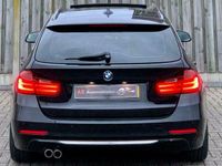 Occasion BMW 330 Luxury Line 257 PK (189 kW) 2013 Zwart Stationwagen