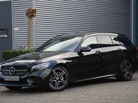 Occasion Mercedes C180 AMG line 157 PK (115 kW) 2021 Zwart Stationwagen