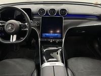 Occasion Mercedes C180 AMG line 191 PK (140 kW) 2022 Zwart Stationwagen