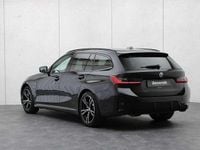 Occasion BMW 330e M Sport 292 PK (214 kW) 2022 Zwart (metallic) Stationwagen