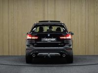 tweedehands BMW 1800 X1 sDrive20i High Executive | Panoramadak | Trekhaakkg!! | Leder