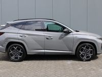 tweedehands Hyundai Tucson 1.6 T-GDI 230PK HEV N-LINE SKY AUTOMAAT / Leder / Camera / Keyless / Full-Led / Navigatie / Alcantara / Krell Audio / Winterpakket / 19" Lichtmetaal / Panoramadak / Elektrische klep / Parkeer Assistent