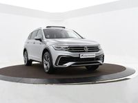 tweedehands VW Tiguan Allspace 1.5 Tsi 150pk DSG R-Line Business 7p. | Climatronic | Pano | Keyless | Camera | Navi | ACC | App-Connect | Trekhaak | 19'' Inch | Garantie t/m 30-05-2027 of 100.000km