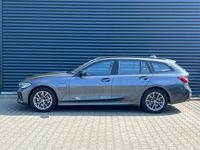 tweedehands BMW 330e 3-serie TouringSport Line Plug in Hybrid PHEV | Merino Leder | Laser Led | Adaptive Cruise | Harman Kardon | 360 Camera | Head-up Display | Memory Stoelen |