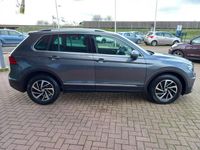 tweedehands VW Tiguan 1.5 TSI ACT DSG Comfortline Business, Airco(automatisch), Multimediasysteem, Cruise control(adaptief), Panorama/schuifkanteldak, Telefoonintegratie, Parkeersensoren, Spraakbediening, Dimlicht automatisch, Elektrische ramen en spiegels(in