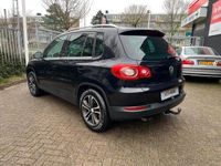 tweedehands VW Tiguan 1.4 TSI Sport&Style 6 tot 12 maanden garantie