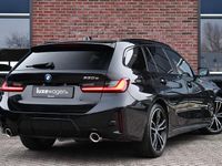 Occasion BMW 330e M Sport 292 PK (214 kW) 2022 Zwart (metallic) Stationwagen