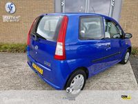 Occasion Daihatsu Cuore 59 PK (43 kW) 2008 Blauw Hatchback