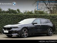 Occasion BMW 550e Comfort Edition 313 PK (230 kW) 2025 Grijs (metallic) Stationwagen