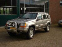 tweedehands Jeep Grand Cherokee 4.0i Laredo luxe auto met eventueel chromen sidebars aanwezig