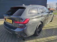 tweedehands BMW 330e 3-serie TouringM Sport Plug In Hybrid | Apple Carplay | LED | Head Up | Alcantara Sportstoelen | Live Cockpit | 18"L.M | DAB | Navi |