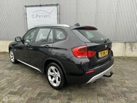 tweedehands BMW X1 sDrive18i Executive Automaat 2010 / Navigatie / Parkeersensors v+a / Trekhaak / Bluetooth / Clima / NAP