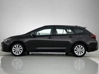 Occasion Toyota Corolla Hybrid Limited 2024 Bruin Stationwagen
