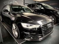 Occasion Audi A6 S-Line 313 PK (230 kW) 2012 Zwart (metallic) Stationwagen