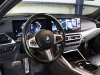 Occasion BMW 330e Executive 294 PK (216 kW) 2023 Zwart (metallic) Stationwagen