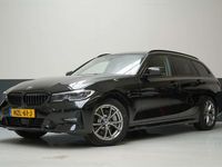 Occasion BMW 330e Basis 292 PK (214 kW) 2021 Zwart Stationwagen
