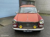 tweedehands Peugeot 404 Familiale 1.6 1963 rood 7 persoons 1ste serie
