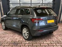 tweedehands Skoda Karoq 1.5 TSI 150PK Celebration DSG Automaat | Virtual cockpit | Adaptive cruise | Lane assist | Side assist | Trekhaak