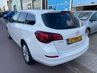 tweedehands Opel Astra Sports Tourer 1.4 Cosmo Station 2011 NAP 170.593km Automatische Airco, 17" Sportwielen, Half LEDER interieur, etc. Boekjes aanwezig.