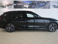 tweedehands BMW 320e 3-SERIE TouringM-Sportpakket / Travel Pack / Panoramadak / Driving Assistant