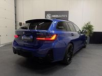 Occasion BMW 330 Executive 291 PK (214 kW) 2022 Blauw Stationwagen