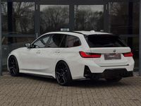 Occasion BMW 330e Basis 292 PK (214 kW) 2023 Wit Stationwagen