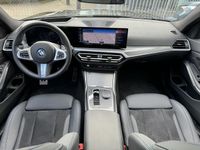 tweedehands BMW 320e 3-SERIE TouringM sport NEW MODEL aut pano/dak. head up, memory stoelen, blacl pack, etc .