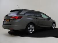 tweedehands Opel Astra Sports Tourer 1.2 111pk Business Elegance Limited | Airco | Cruise | PDC V + A | Navi Via App |