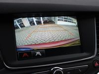 tweedehands Opel Astra Sports Tourer 1.2 Turbo 130 Design & Tech Automatische Airconditioning / Lichtmetalen Velgen Zwart / Parkeersensoren / Parkeercamera / Cruise Control / Navigatie / Privacy Glass