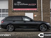 Occasion BMW 330e 292 PK (214 kW) 2023 Zwart Stationwagen