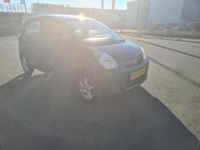 Occasion Daihatsu Cuore 69 PK (50 kW) 2008 Zwart, metallic lak Hatchback