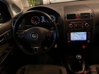 tweedehands VW Touran 1.6 TDI 105pk Highline 7-Zits Navi Camera