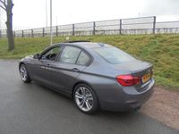 tweedehands BMW 330 3-SERIE i sedan xDrive airco schuifdak lmv navigatie xenon voll leer