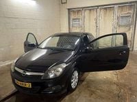 Occasion Opel Astra GTC 140 PK (102 kW) 2009 Zwart Coupé