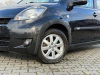 Occasion Daihatsu Sirion 93 PK (68 kW) 2011 Zwart Hatchback