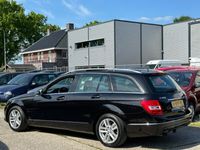 tweedehands Mercedes 180 C-KLASSE EstatePrestige Avantgarde Aut7 | ECC | LMV | Navi | Schuifdak | Trekhaak