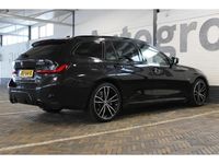 Occasion BMW 330 Shadowline 293 PK (215 kW) 2023 Zwart Stationwagen