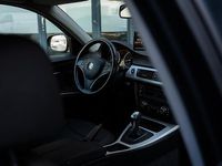 Occasion BMW 318 143 PK (105 kW) 2009 Zwart Stationwagen