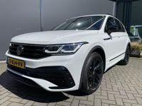 tweedehands VW Tiguan 1.5 TSI R-Line Business Automaat // NIEUWE AUTO - Full Options // Clim. control - A-Cruise control - Parks. V+A - Pano-S/K dak - Navi - App connect - Radio/USB/AUX/DAB/TEL - MFL- Sport Stuurwiel incl. paddels - 19"LMV - CD+AB - Ramen E-V