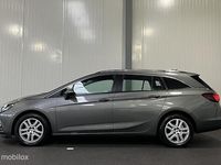 Occasion Opel Astra 110 PK (80 kW) 2017 Grijs (metallic) Stationwagen