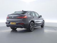 tweedehands BMW X4 xDrive20i M sport | panoramadak Auto is ingezet