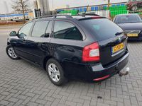 Occasion Skoda Octavia Business Line 105 PK (77 kW) 2011 Zwart Stationwagen