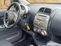 Occasion Daihatsu Sirion 91 PK (66 kW) 2007 Beige Hatchback
