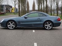 tweedehands Mercedes SL350 l 245 PK l Nederlands geleverde Auto l Keyless Go l Hout leder Stuurwiel l Bi- Xenon l PTS l Comand l CD Wisselaar l Beige Leder l Stoelverwarming l Memory pakket l Dynamische multicontour stoelen voor l Alarm klasse 3...