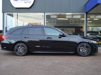 Occasion Mercedes C200 AMG line 204 PK (150 kW) 2021 Zwart Stationwagen