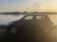 Occasion Suzuki Swift Exclusive 94 PK (69 kW) 2013 Zwart Hatchback