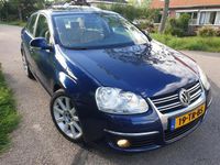 tweedehands VW Jetta 2.0 FSI Highline/Automaat/Leder/Opendak/Airco/Lichte schade