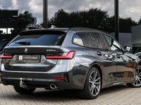 Occasion BMW 330 Basis 291 PK (214 kW) 2022 Grijs Stationwagen